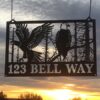 "Eagle Sign 123 Bell Way" metal sign