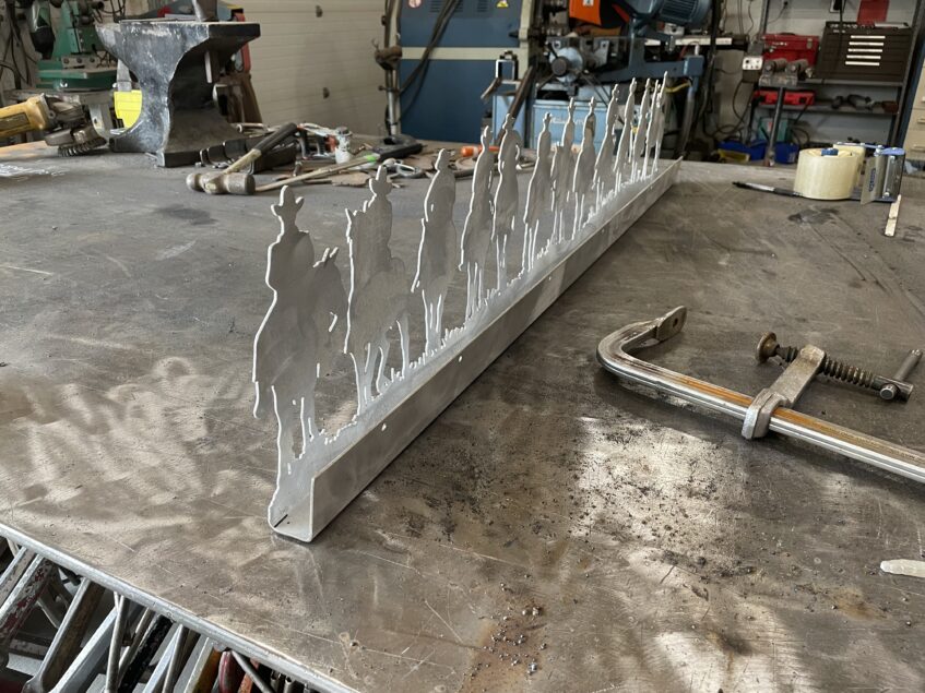 12 Cowboys backlit metal wall art showing steel wall standoff